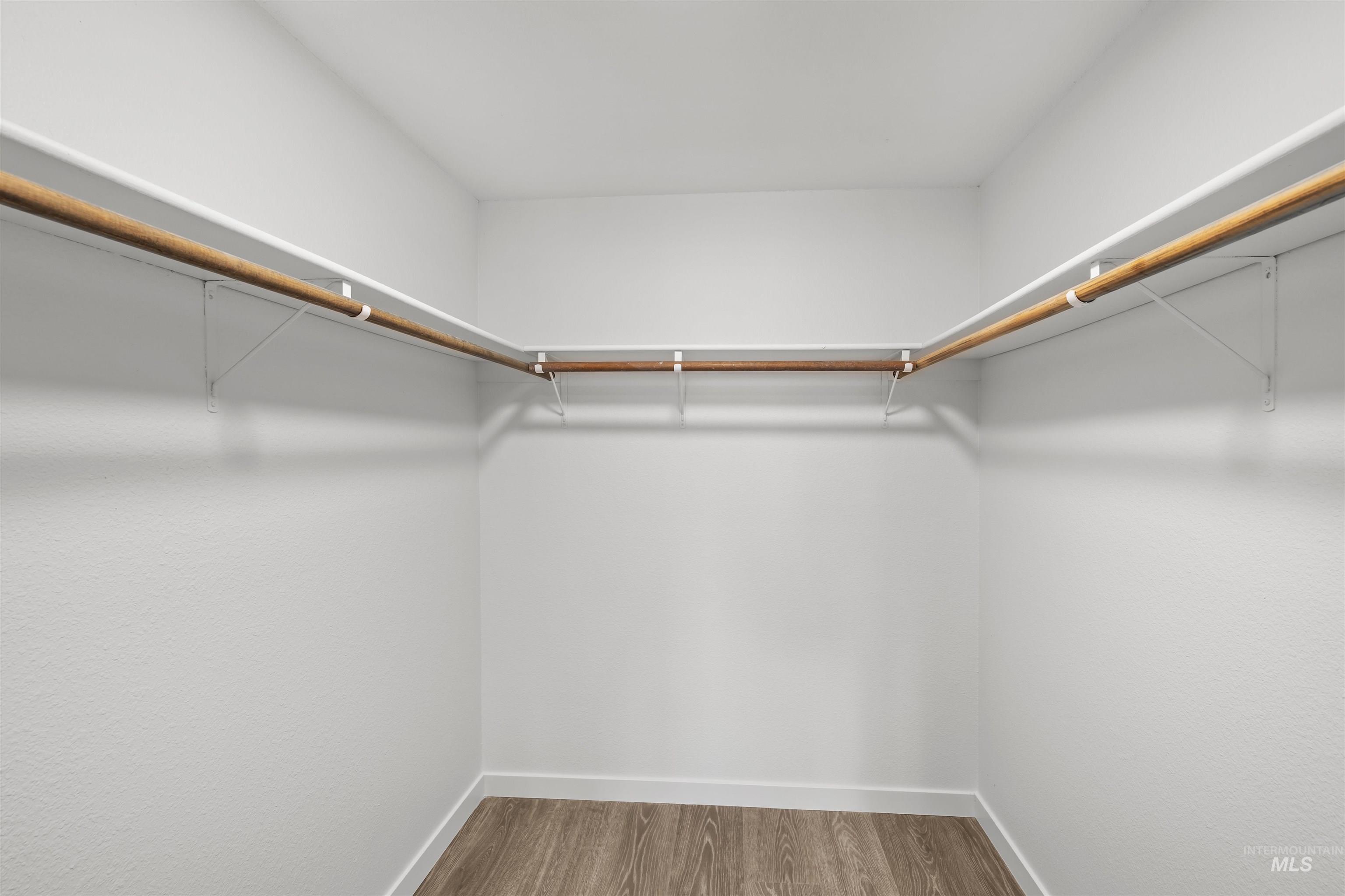 7144 West Diamond Street Boise, ID 83709 - Photo 17 of 47 Walk in closet featuring wood finished floors