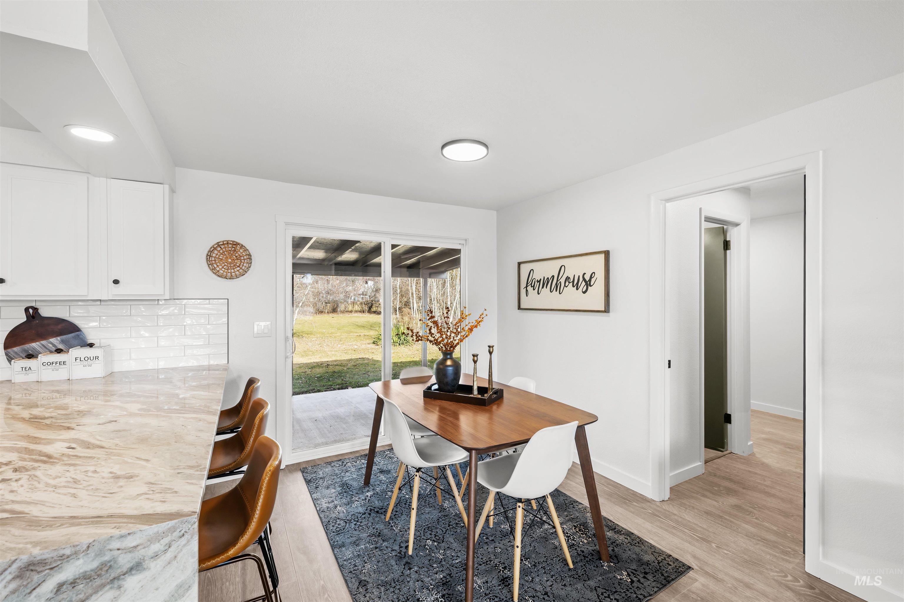 7144 West Diamond Street Boise, ID 83709 - Photo 7 of 47 Dining area with light wood-style floors and recessed lighting