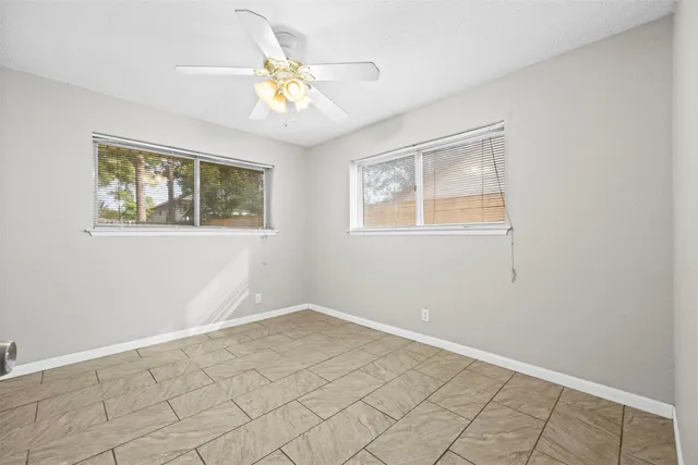a view of an empty room with window