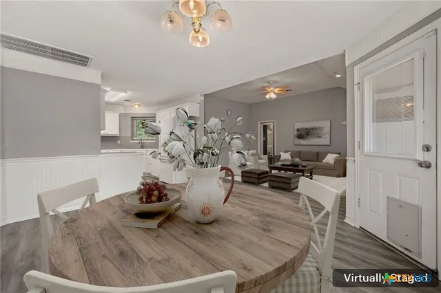a view of a dining room with furniture