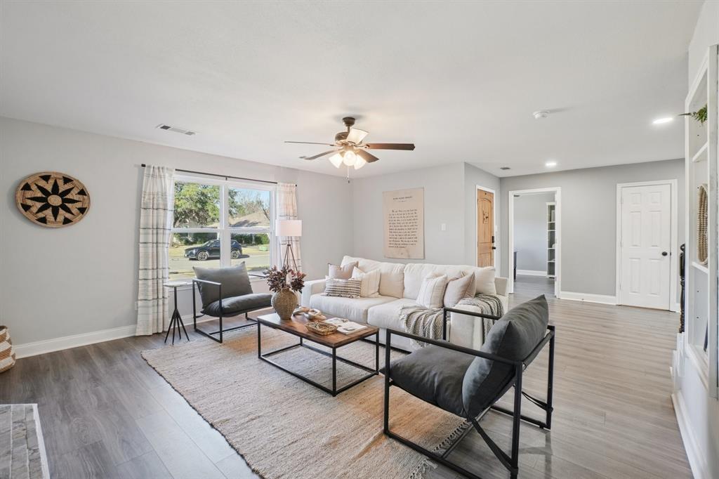 7006 Burning Bush Sachse, TX 75048 - Photo 6 of 39 a living room with furniture and a window