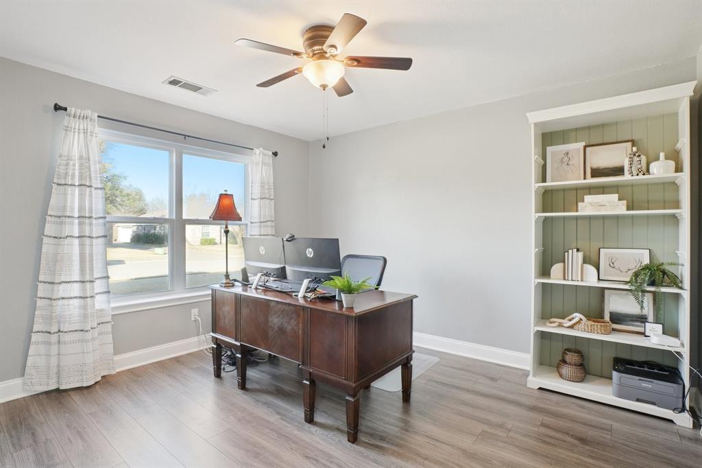 7006 Burning Bush Sachse, TX 75048 - Photo 10 of 39 a view of a workspace with furniture and a window