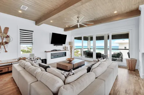 a kitchen with stainless steel appliances kitchen island granite countertop a sink and cabinets