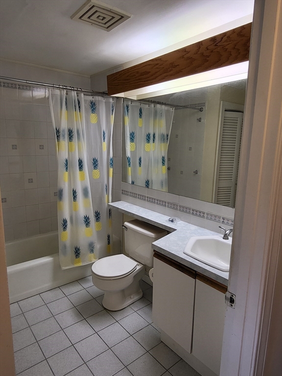 35 Walden Street, Unit 3B Cambridge, MA 02140 - Photo 12 of 39 a bathroom with a sink toilet and shower