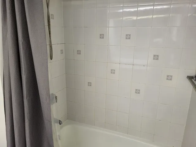 a bathroom with a bathtub