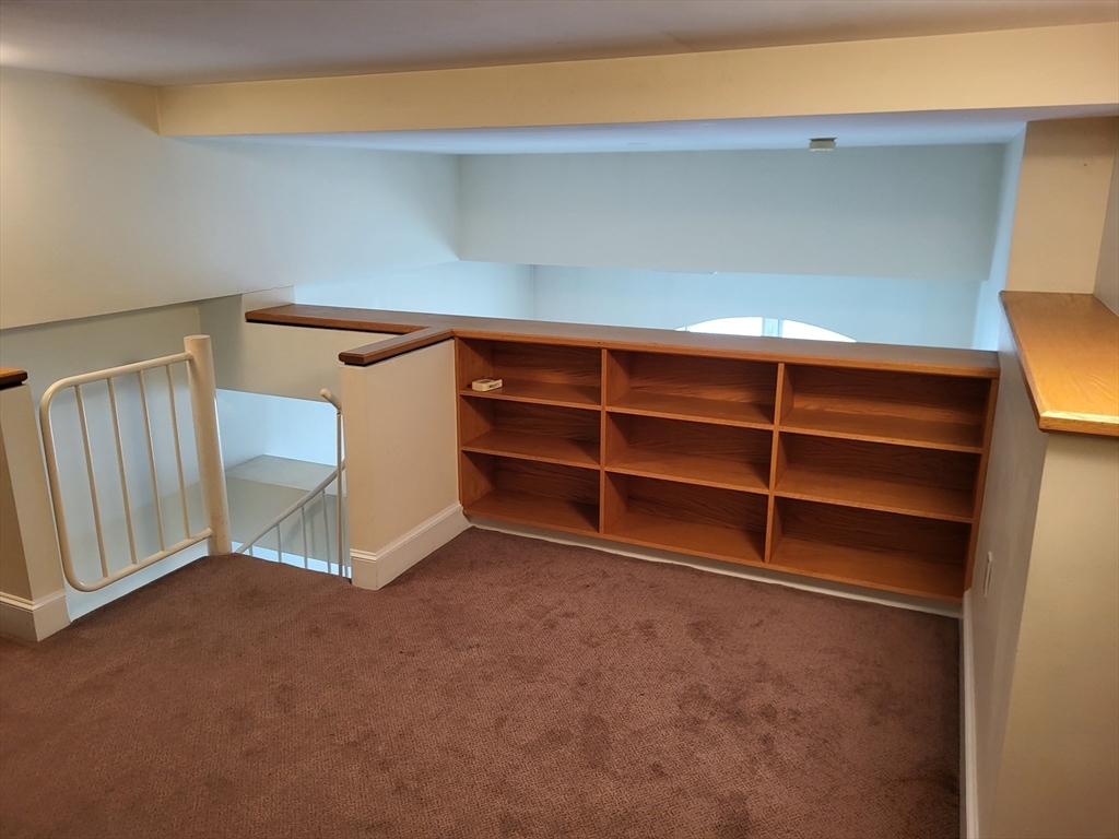 35 Walden Street, Unit 3B Cambridge, MA 02140 - Photo 21 of 39 a room with a furniture and a window
