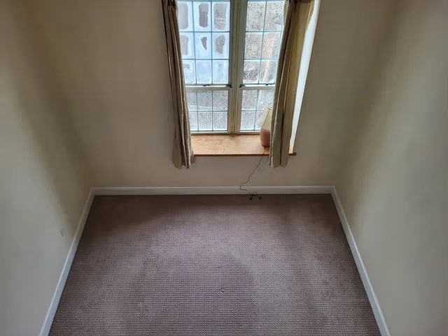 an empty room with a window