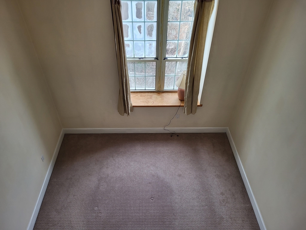 35 Walden Street, Unit 3B Cambridge, MA 02140 - Photo 22 of 39 an empty room with a window