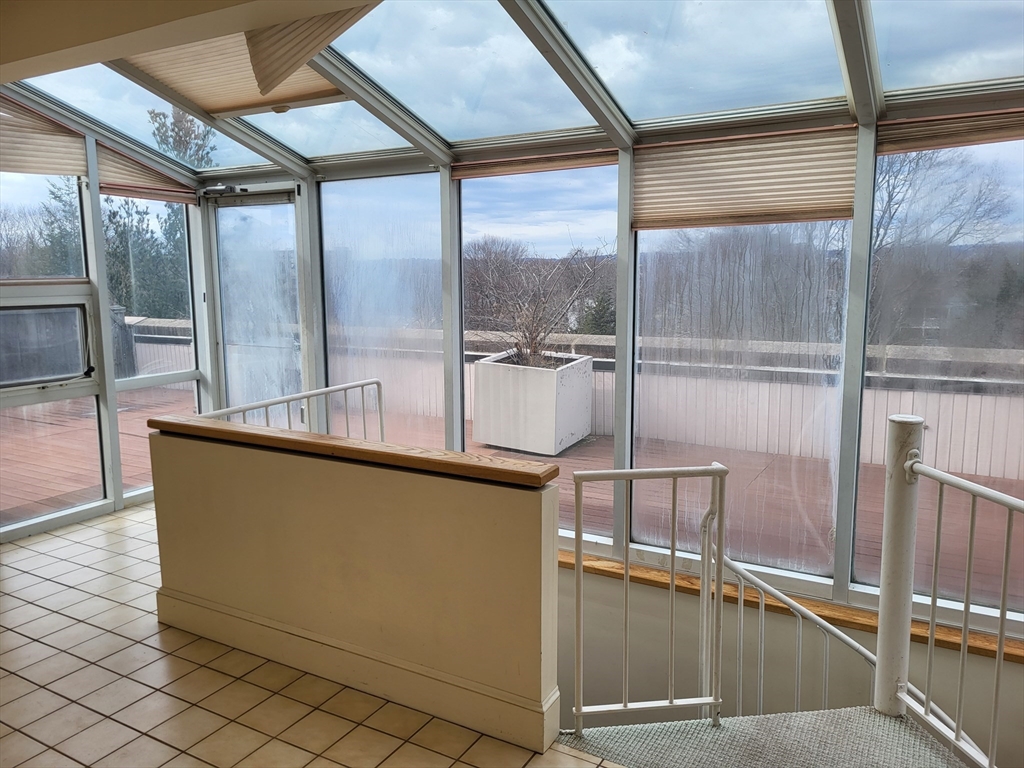 35 Walden Street, Unit 3B Cambridge, MA 02140 - Photo 28 of 39 a view of a living room with a large window