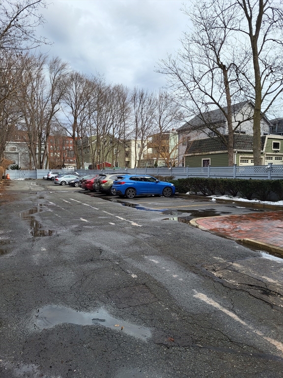 35 Walden Street, Unit 3B Cambridge, MA 02140 - Photo 36 of 39 a view of street with trees