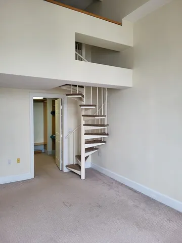 a view of a livingroom with a hallway