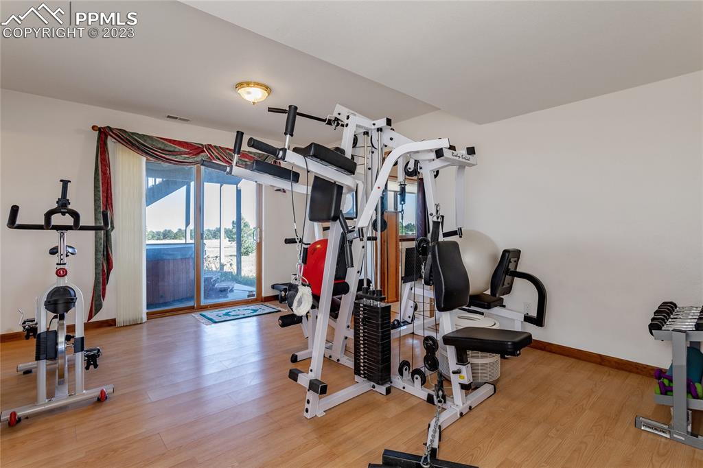 18165 Pinon Park Road Peyton, CO 80831 - Photo 31 of 44 a view of a room with gym equipment
