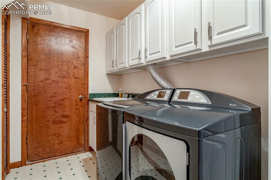 18165 Pinon Park Road Peyton, CO 80831 - Photo 32 of 44 a close view of a sink and cabinets