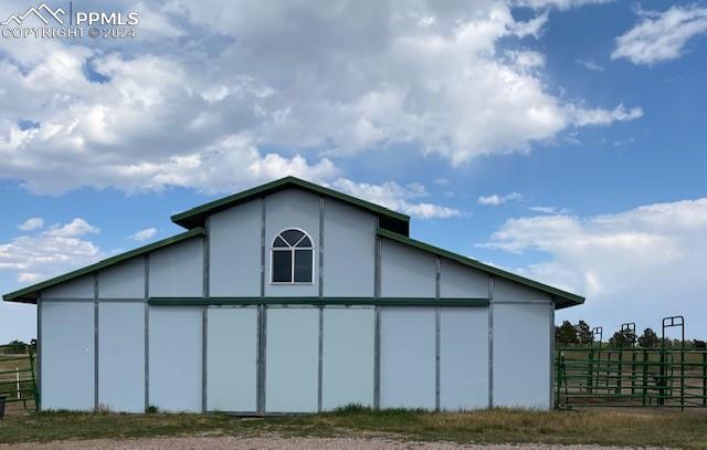 18165 Pinon Park Road Peyton, CO 80831 - Photo 42 of 44 a house view with a garden space