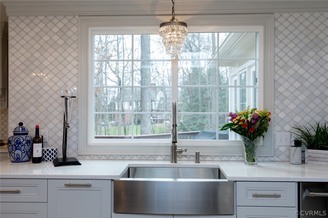2530 Rochester Court Midlothian, VA 23113 - Photo 11 of 46 a view of a counter top a sink and a potted plant