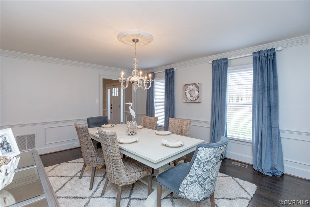 2530 Rochester Court Midlothian, VA 23113 - Photo 19 of 46 a view of a dining room with furniture window and wooden floor