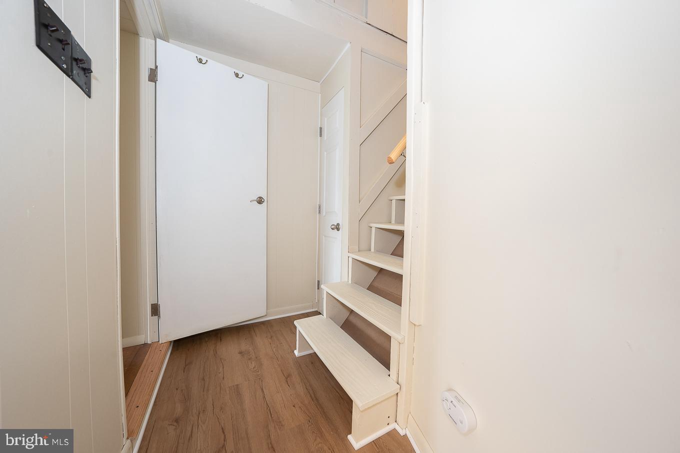 437 Meadowcroft Road Wayne, PA 19087 - Photo 13 of 19 a view of a hallway with wooden floor and entryway