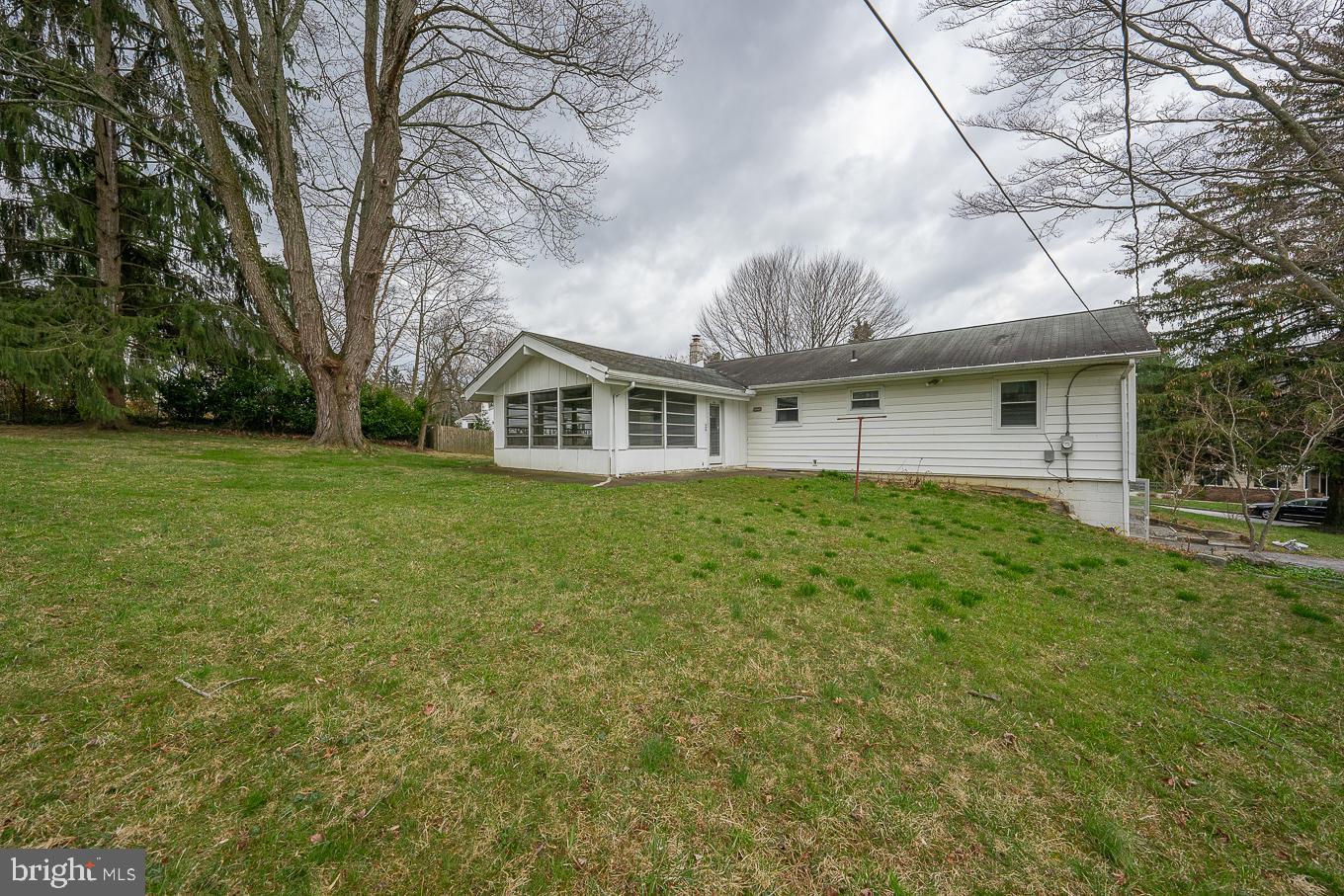 437 Meadowcroft Road Wayne, PA 19087 - Photo 18 of 19 a house view with a garden space