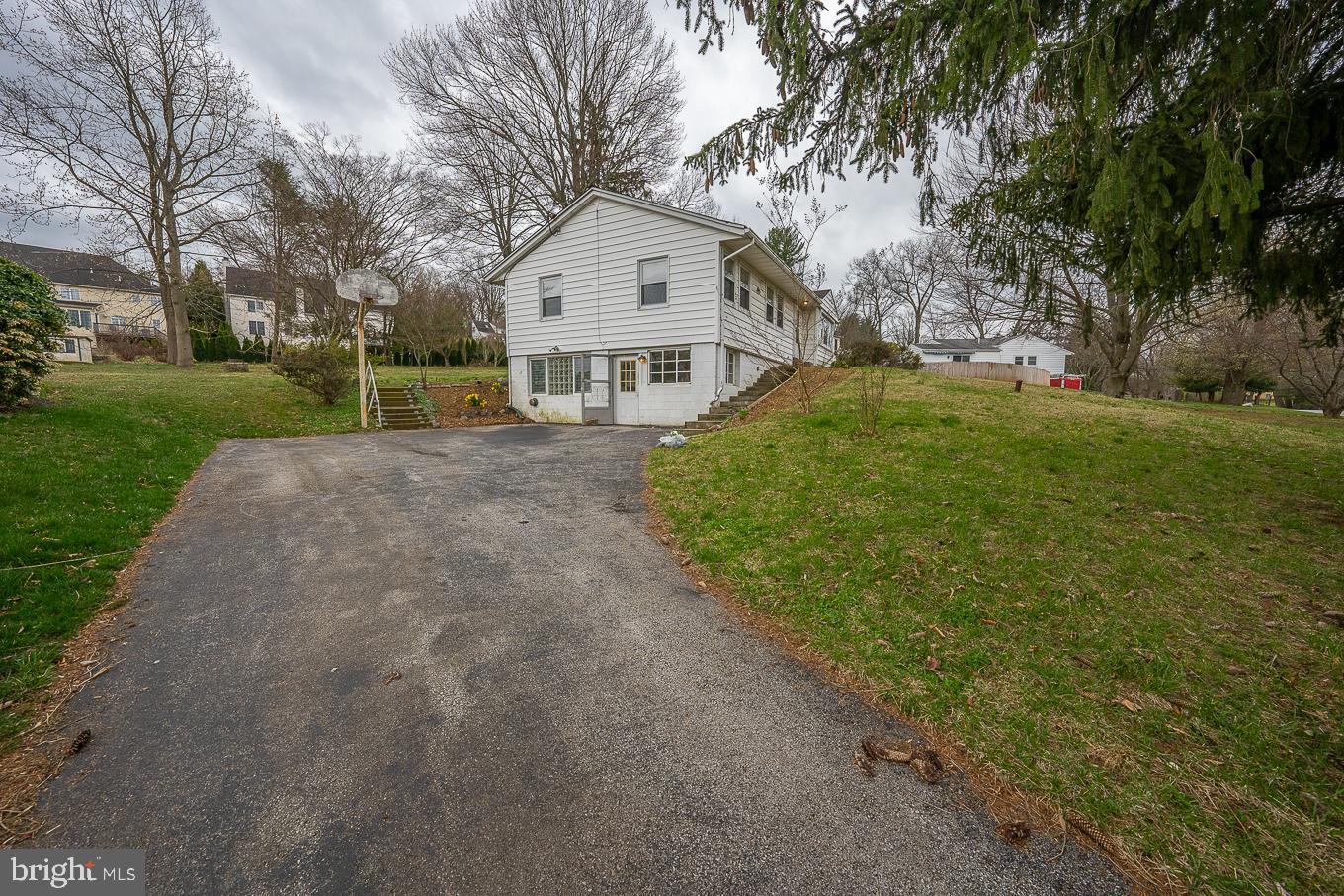 437 Meadowcroft Road Wayne, PA 19087 - Photo 19 of 19 a front view of a house with garden