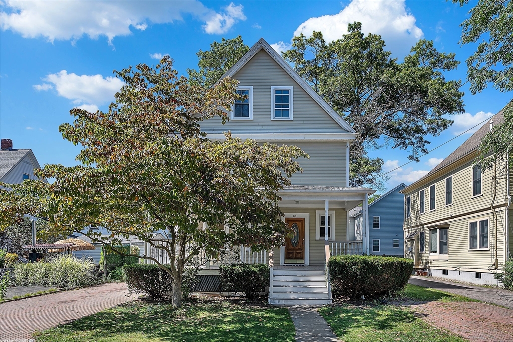 13 Weir Street Newton, MA 02466 - Photo 1 of 41 a front view of a house with garden