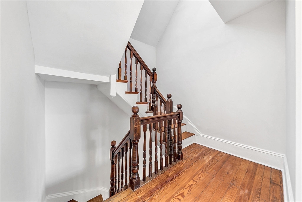 13 Weir Street Newton, MA 02466 - Photo 20 of 41 a view of entryway with wooden floor