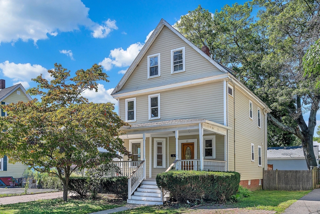 13 Weir Street Newton, MA 02466 - Photo 2 of 41 a front view of a house with a yard