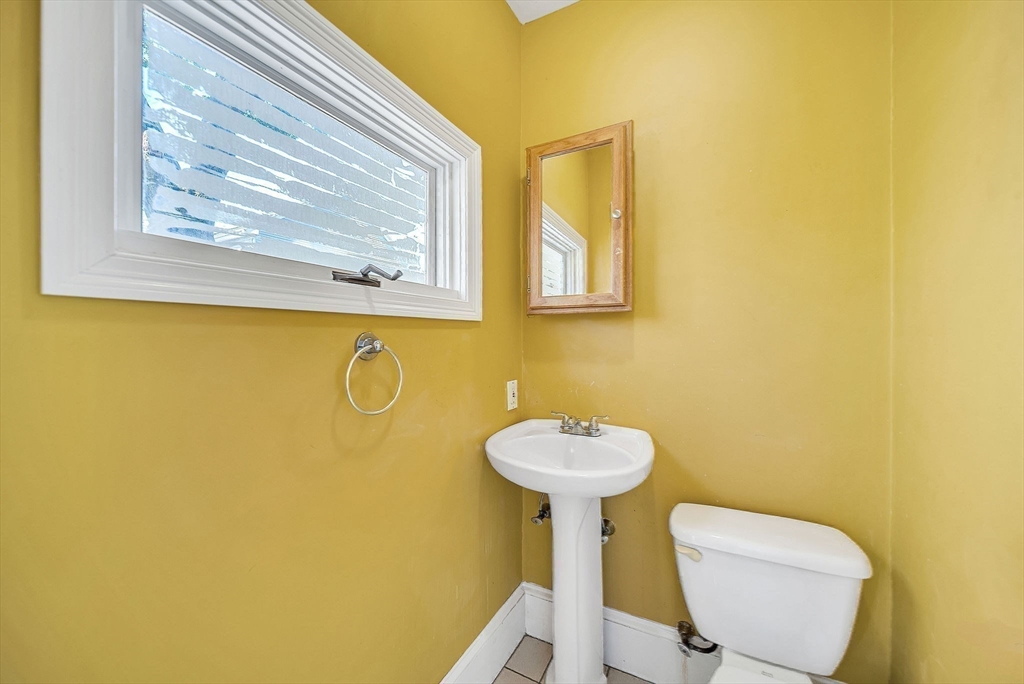 13 Weir Street Newton, MA 02466 - Photo 34 of 41 a bathroom with a toilet and a sink