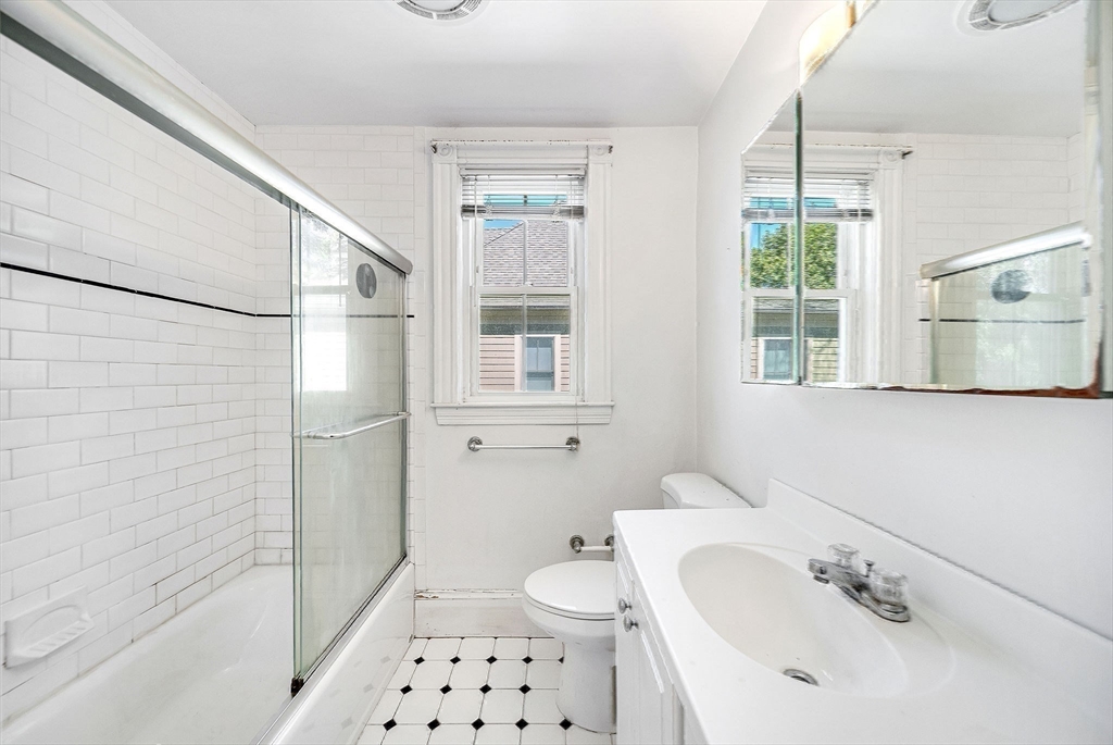 13 Weir Street Newton, MA 02466 - Photo 35 of 41 a bathroom with a sink toilet and shower