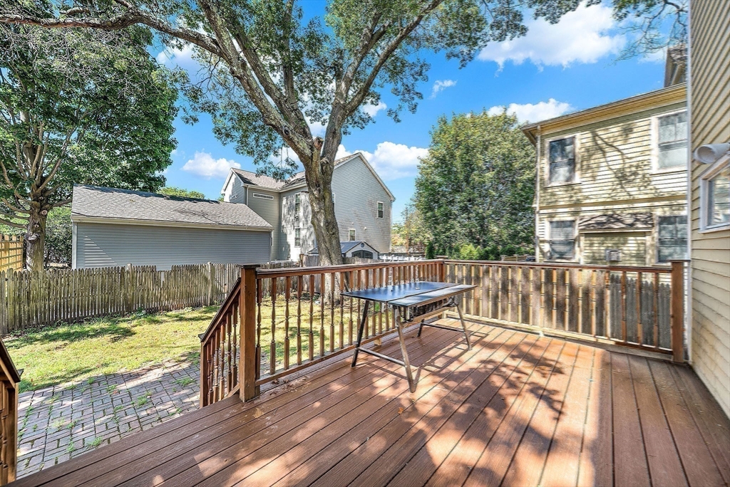 13 Weir Street Newton, MA 02466 - Photo 40 of 41 a view of balcony with wooden floor and outdoor seating