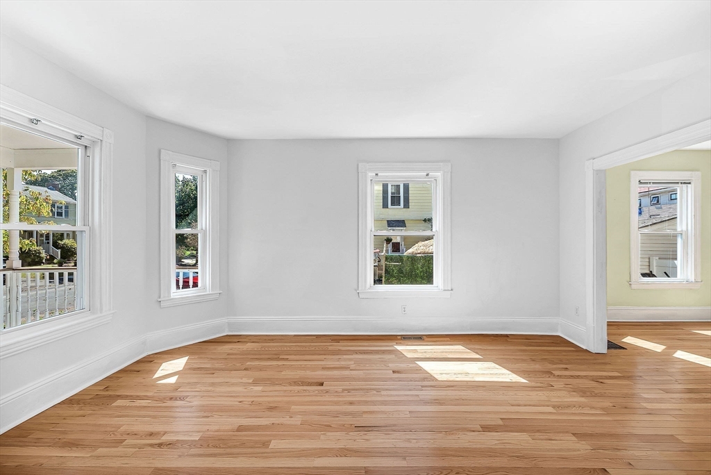 13 Weir Street Newton, MA 02466 - Photo 5 of 41 a view of empty room with wooden floor and fan