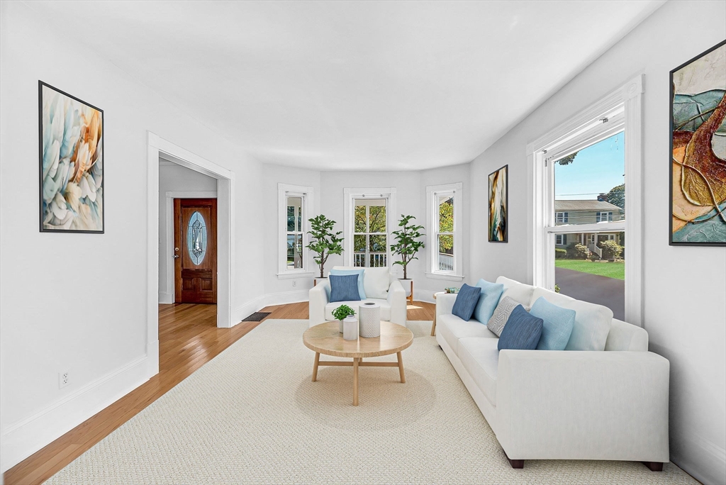 13 Weir Street Newton, MA 02466 - Photo 7 of 41 a living room with furniture and a large window