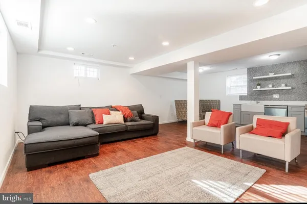 a living room with furniture and a couch