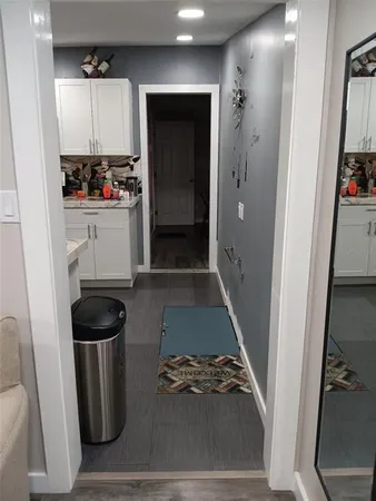 a bathroom with a sink and mirror