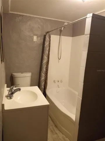 a bathroom with a sink and a toilet