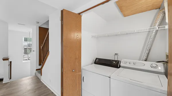 a utility room with dryer and washer