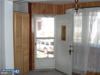 549 Millbank Road Upper Darby, PA 19082 - Photo 2 of 12 a bathroom with a window and a shower