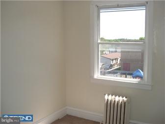 549 Millbank Road Upper Darby, PA 19082 - Photo 10 of 12 a view of a small space with a window