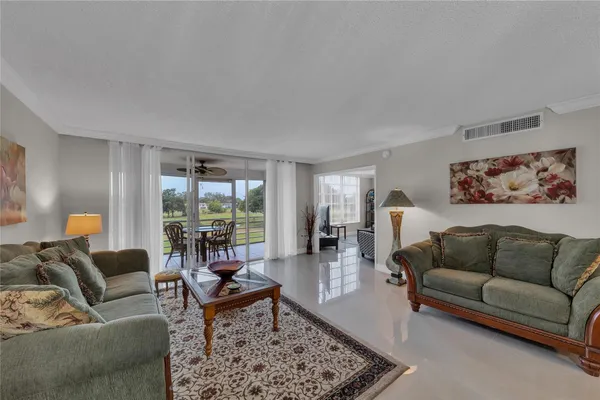 a living room with furniture and a couch