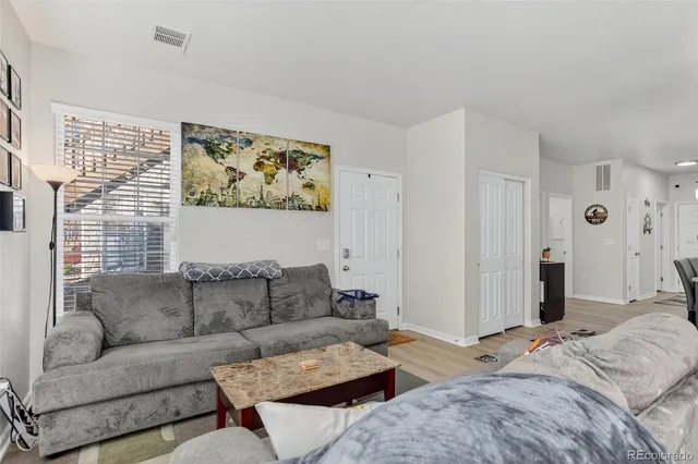 a living room with furniture and a couch