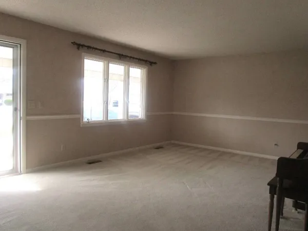 an empty room with a window