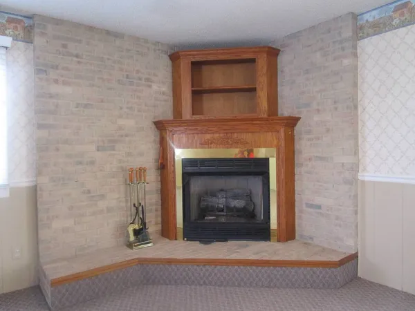a living room with a fireplace