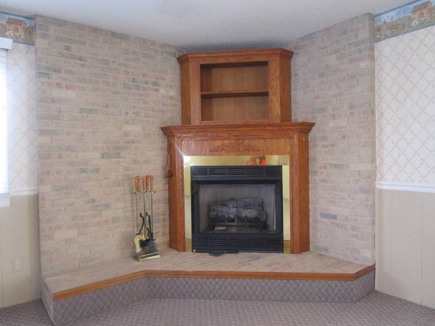 306 College Boulevard Carmi, IL 62821 - Photo 10 of 23 a living room with a fireplace