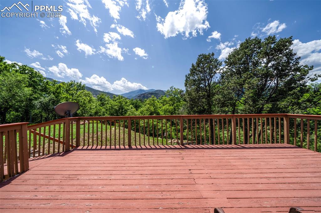 130 Cresta Road Colorado Springs, CO 80906 - Photo 4 of 49 a view of balcony with wooden floor