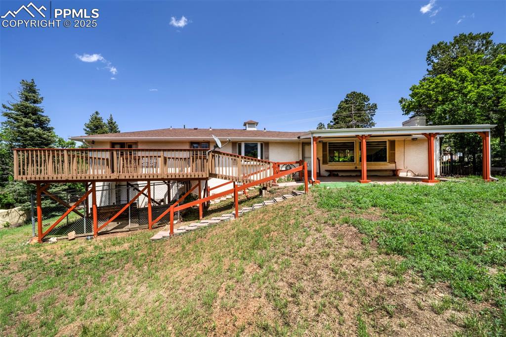 130 Cresta Road Colorado Springs, CO 80906 - Photo 45 of 49 front view of a house with a yard