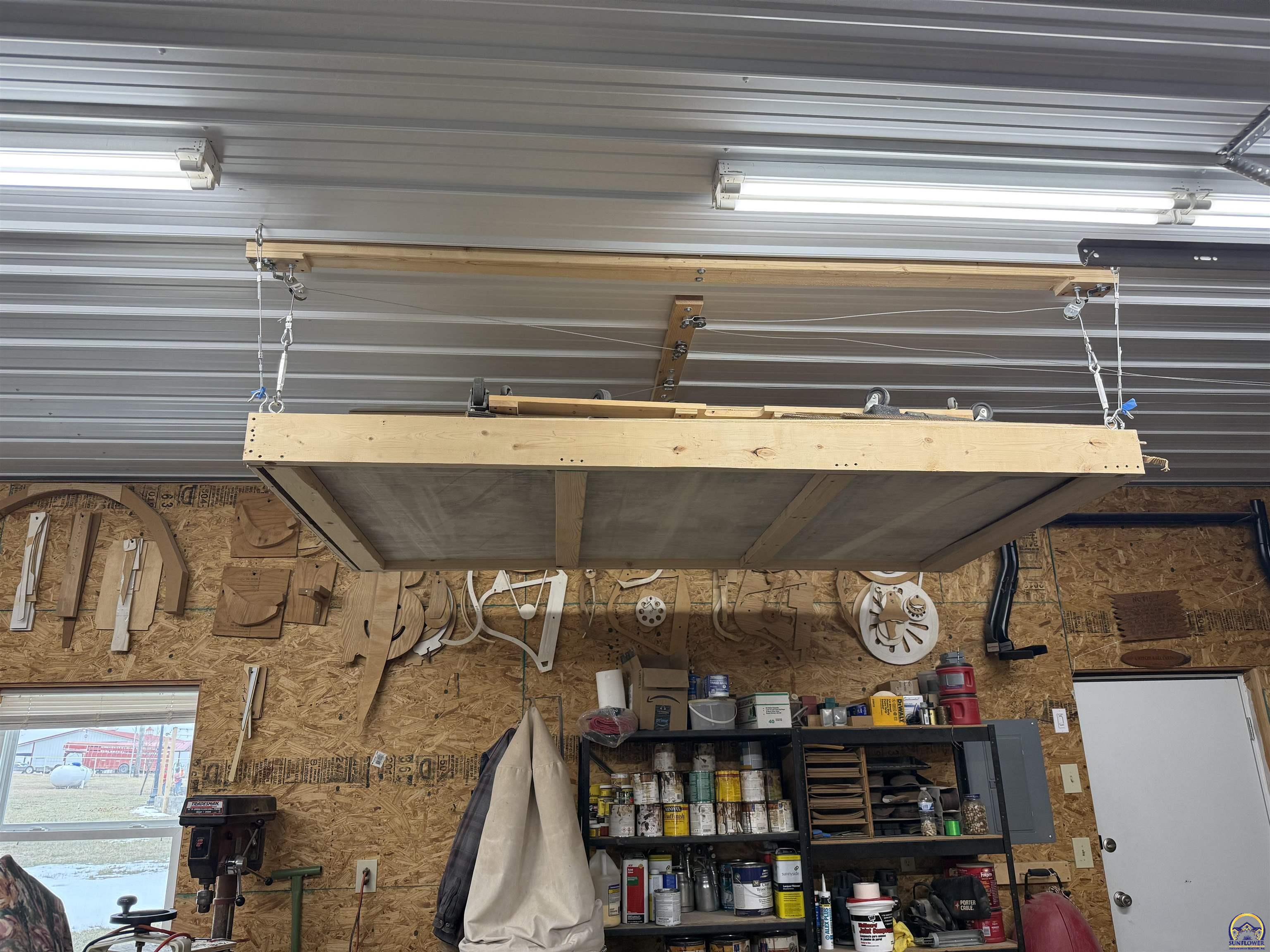 2915 Oak Hill Road Vassar, KS 66543 - Photo 42 of 46 Lift Storage in Workshop