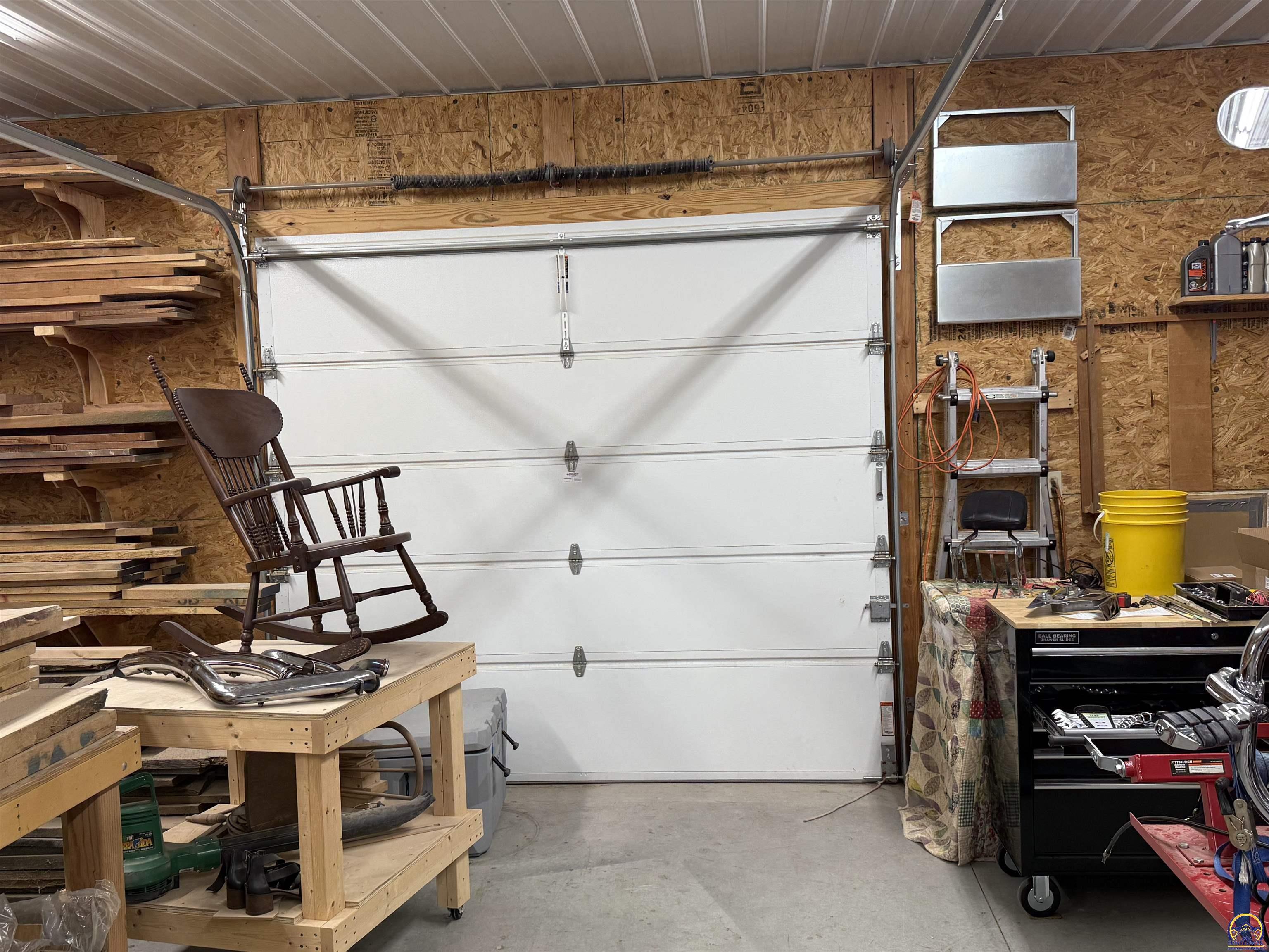 2915 Oak Hill Road Vassar, KS 66543 - Photo 43 of 46 South Workshop Garage Door