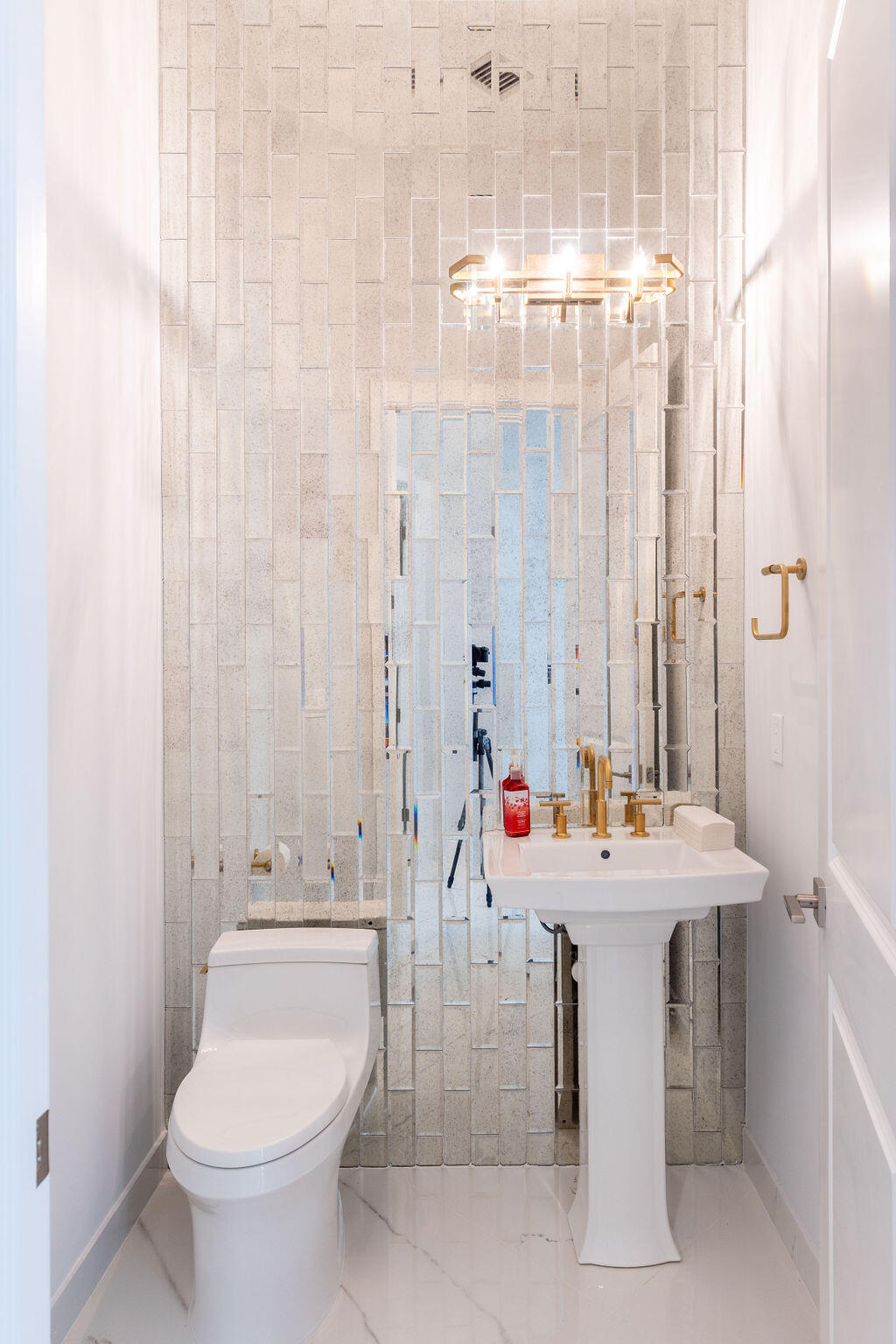 2740 Northwest 69th Street Boca Raton, FL 33496 - Photo 33 of 79 a bathroom with a sink toilet and shower