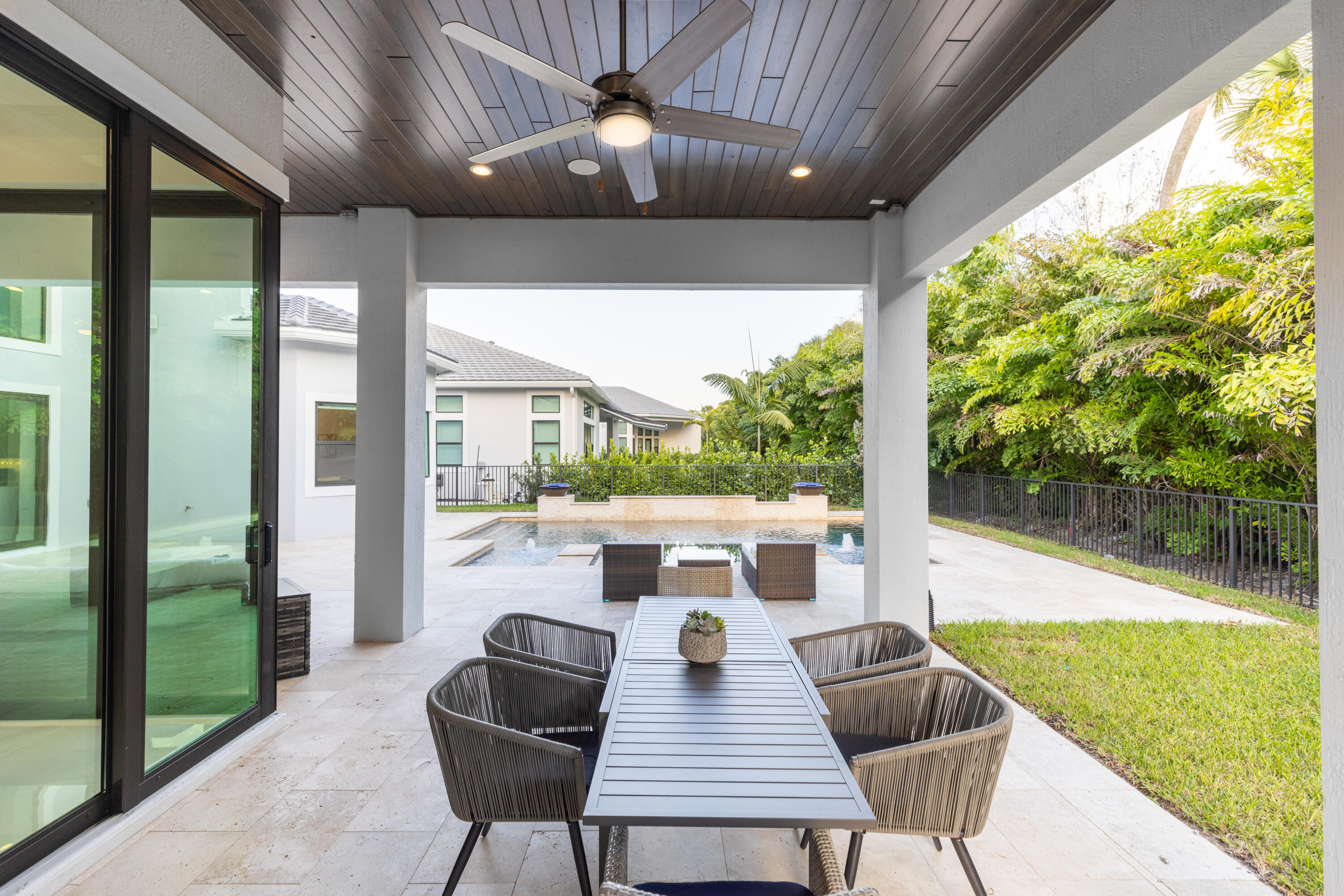 2740 Northwest 69th Street Boca Raton, FL 33496 - Photo 62 of 79 a outdoor view with a sitting space