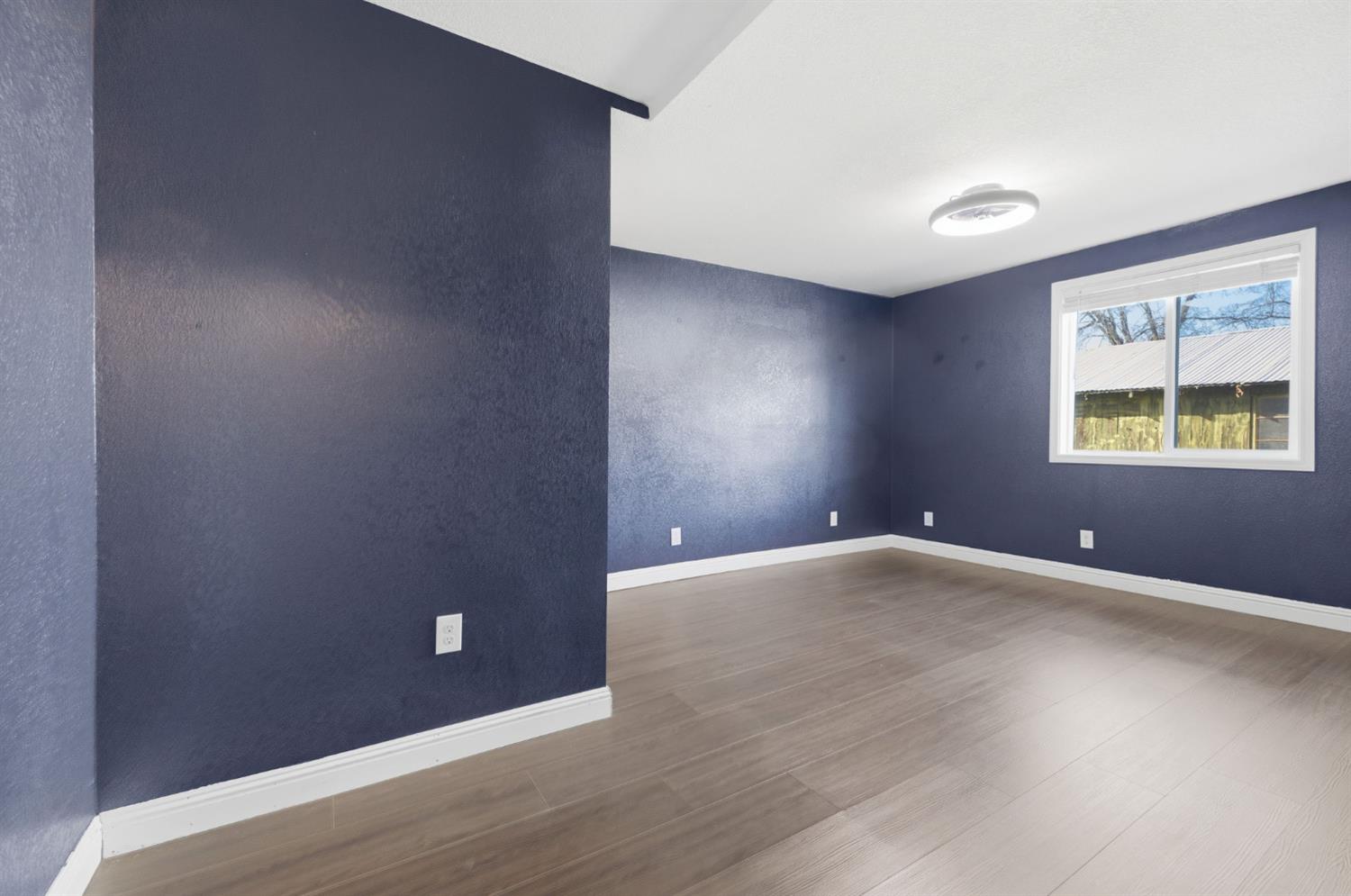 7580 Latrobe Road Shingle Springs, CA 95682 - Photo 19 of 56 an empty room with a window