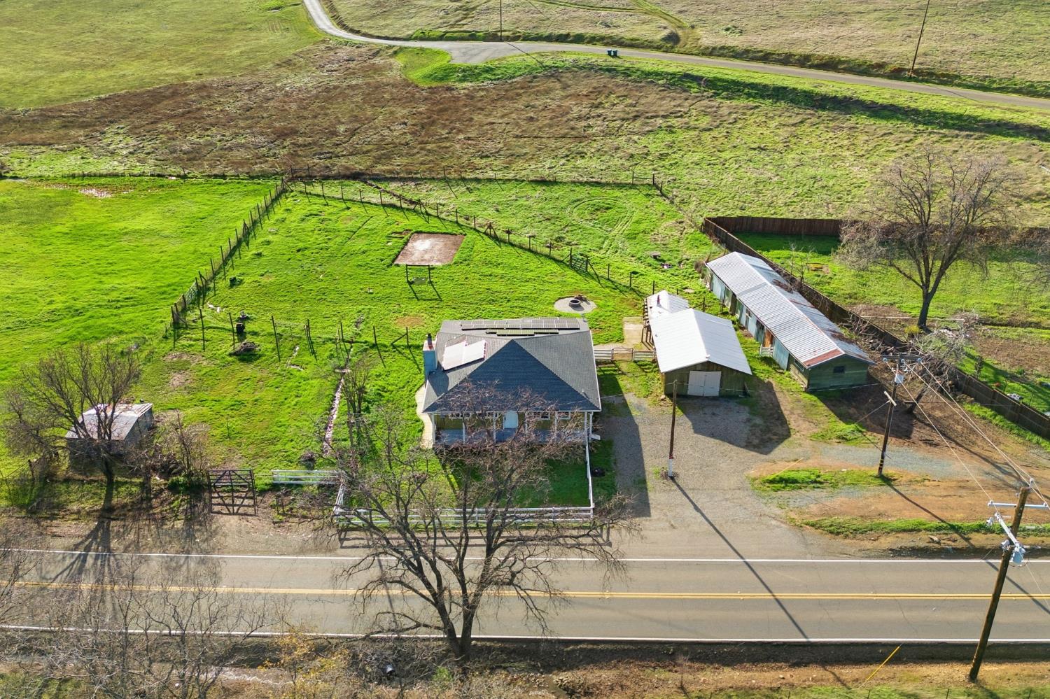 7580 Latrobe Road Shingle Springs, CA 95682 - Photo 25 of 56 a aerial view of a house with a yard